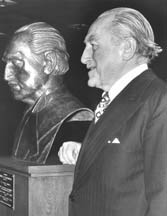 Bruce Macdonald with his bust
