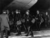R.C.M.P. officers flown from Ottawa dissembark from their chartered plane, 5 November 1945
