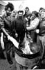 Chrysler Minivan plant workers burn company letters after walkout, 1982