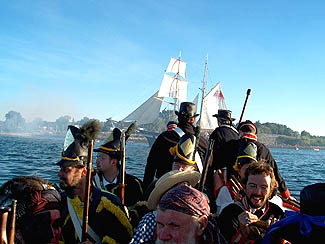 Re-enactors in a naval battle, by David May